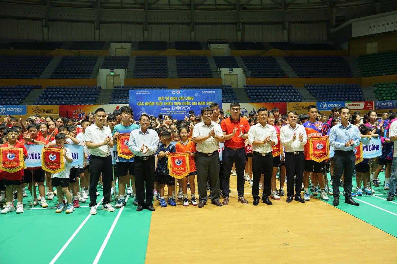Young badminton players in action.