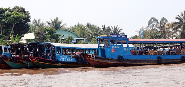 Khách nước ngoài trải nghiệm du lịch sinh thái và văn hóa ở Tiền Giang - ảnh 2