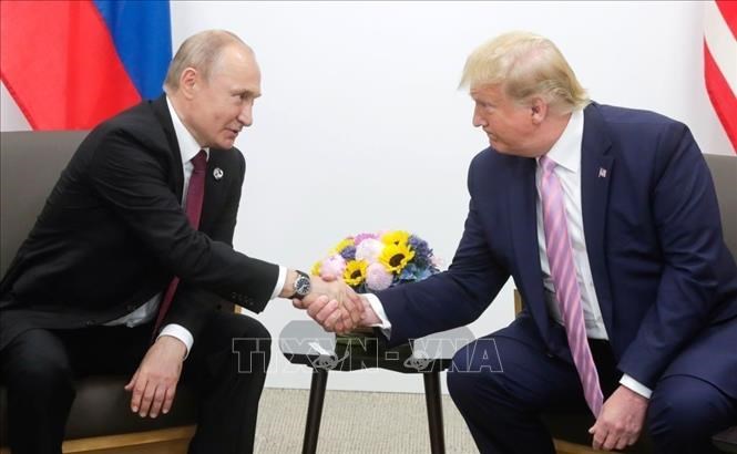 Tổng thống Nga Vladimir Putin (trái) và Tổng thống Mỹ Donald Trump. Ảnh tư liệu:Getty Images/TTXVN