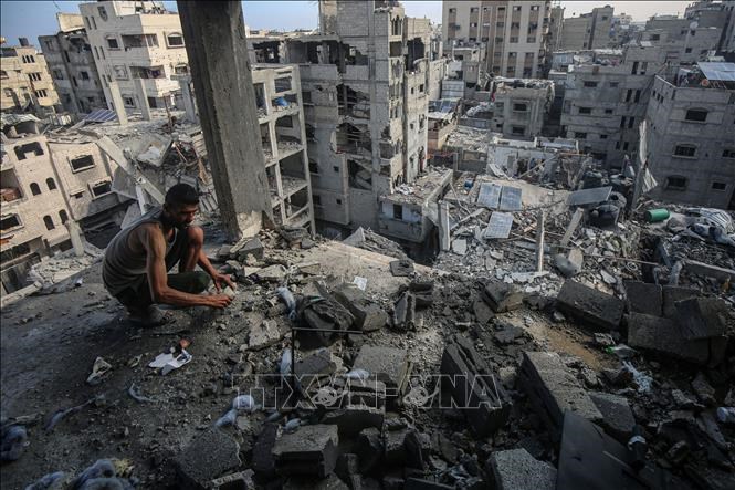 Những tòa nhà bị phá hủy sau các cuộc không kích của Israel xuống Gaza. Ảnh:THX/TTXVN