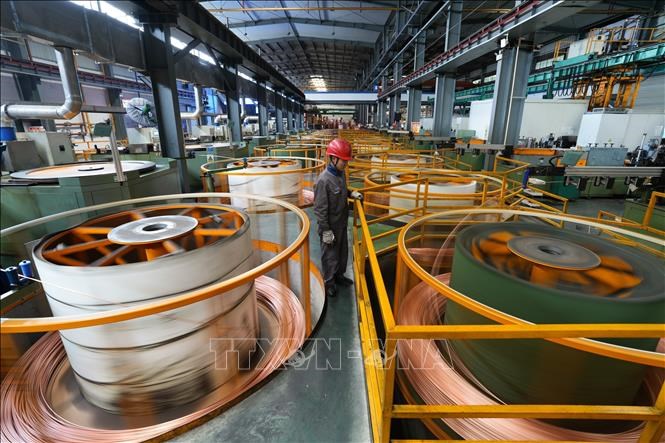 Đồng được sản xuất tại nhà máy ở tỉnh Chiết Giang, Trung Quốc. Ảnh minh họa:THX/TTXVN
