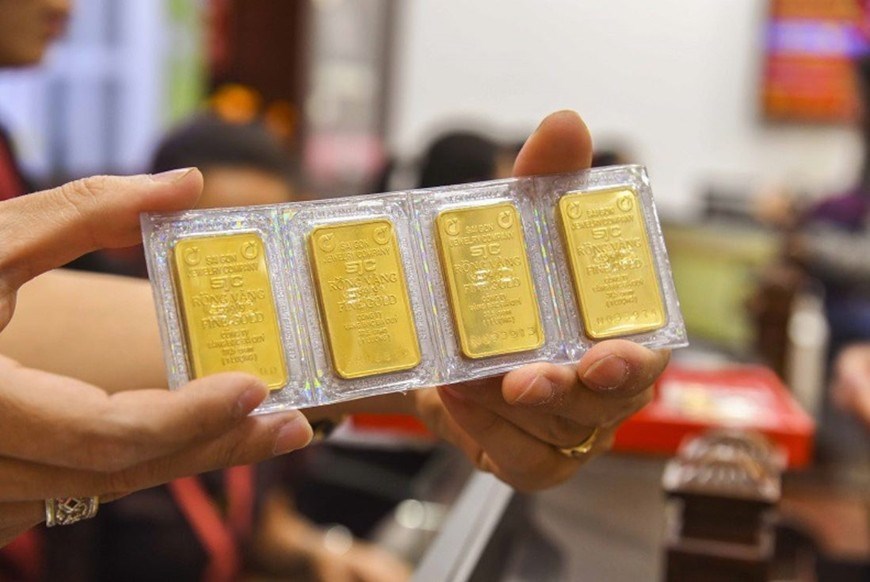 Giá vàng SJC và vàng nhẫn trơn đảo chiều giảm nhẹ - ảnh 1