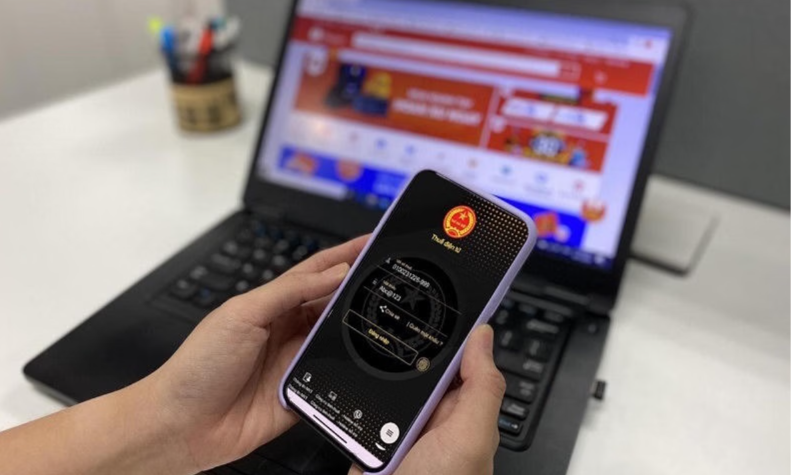 Hộ kinh doanh có thể kê khai thuế qua Chatbot trên ứng dụng eTax Mobile - ảnh 1