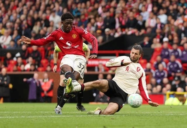 MU hạ Liverpool 3-2, chính thức trở lại Champions League - ảnh 1