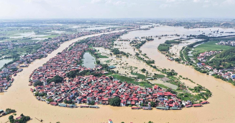 Hậu quả nặng nề và cuộc chạy đua khắc phục hậu quả sau bão lũ - ảnh 1