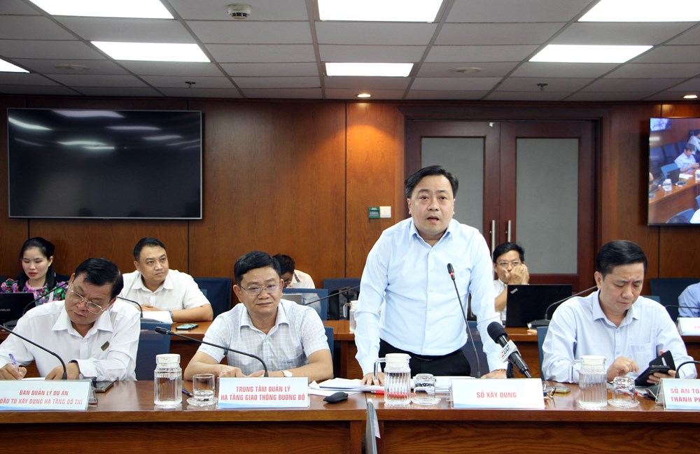TP.HCM: Nhiều tuyến đường liên tục ngập sâu khi mưa lớn, Sở Xây dựng nói gì? - ảnh 1