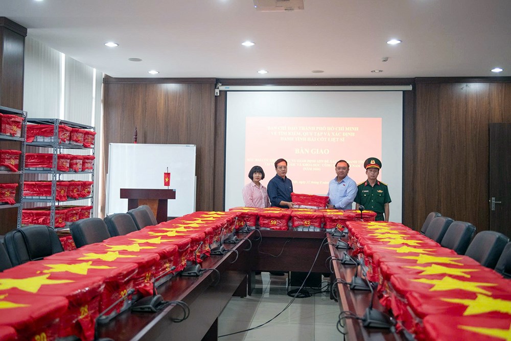 Thiêng liêng lễ bàn giao 7.104 mẫu sinh phẩm hài cốt liệt sĩ - ảnh 16