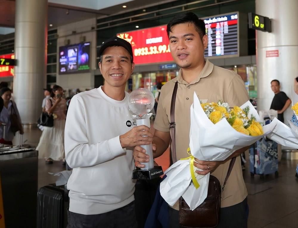 Quyết Chiến, Thanh Tự về nước sau chức vô địch đồng đội thế giới  - ảnh 3