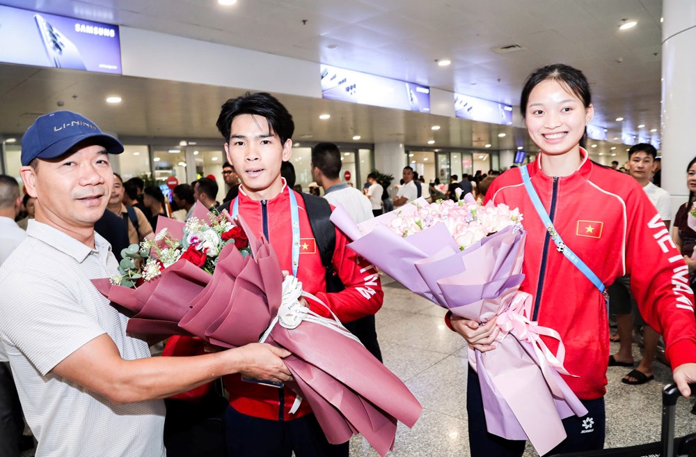 Đội tuyển điền kinh và đua thuyền Việt Nam về nước sau thành công tại ABG6  - ảnh 1