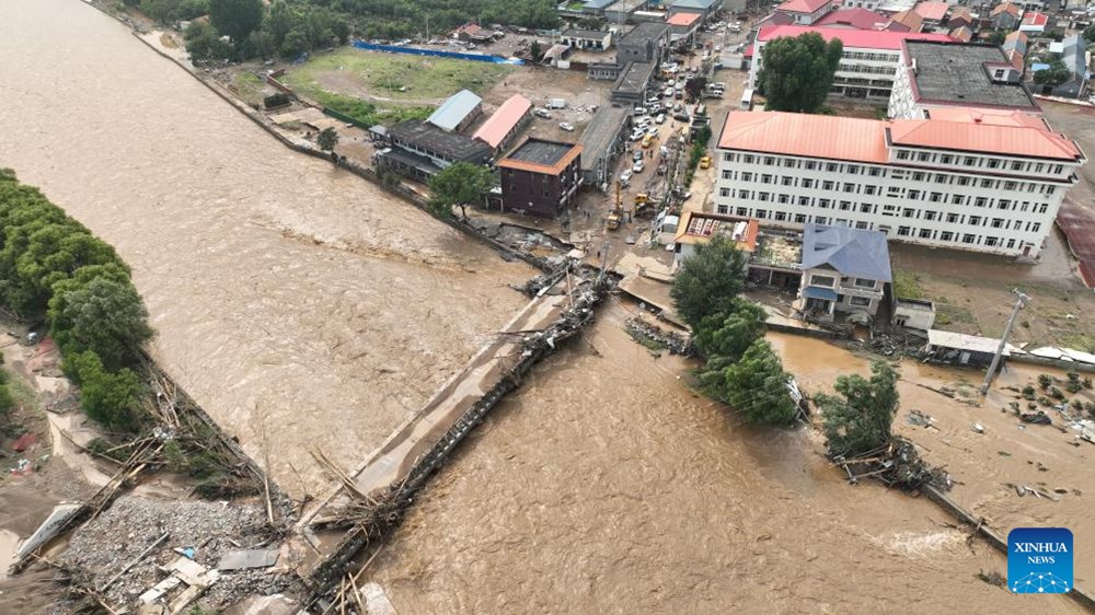 Hơn 30 người thiệt mạng, 80.000 người sơ tán do mưa lũ tại Trung Quốc - ảnh 1