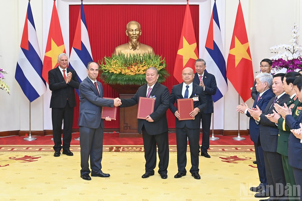 Tổng Bí thư Tô Lâm và Bí thư Thứ nhất Đảng Cộng sản Cuba, Chủ tịch nước Cộng hòa Cuba Miguel Diaz-Canel Bermudez chứng kiến Lễ trao các văn kiện hợp tác - ảnh 7