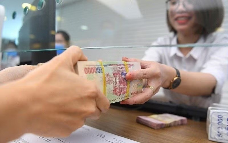 Quy định mới từ 1.8 giúp ngân hàng quốc doanh có thêm dư địa cho vay - ảnh 1