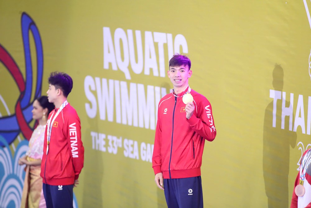 SEA Games 33 ngày thứ ba (12.12): Tiếp cơn mưa vàng, Huy Hoàng thống trị đường đua xanh - ảnh 1