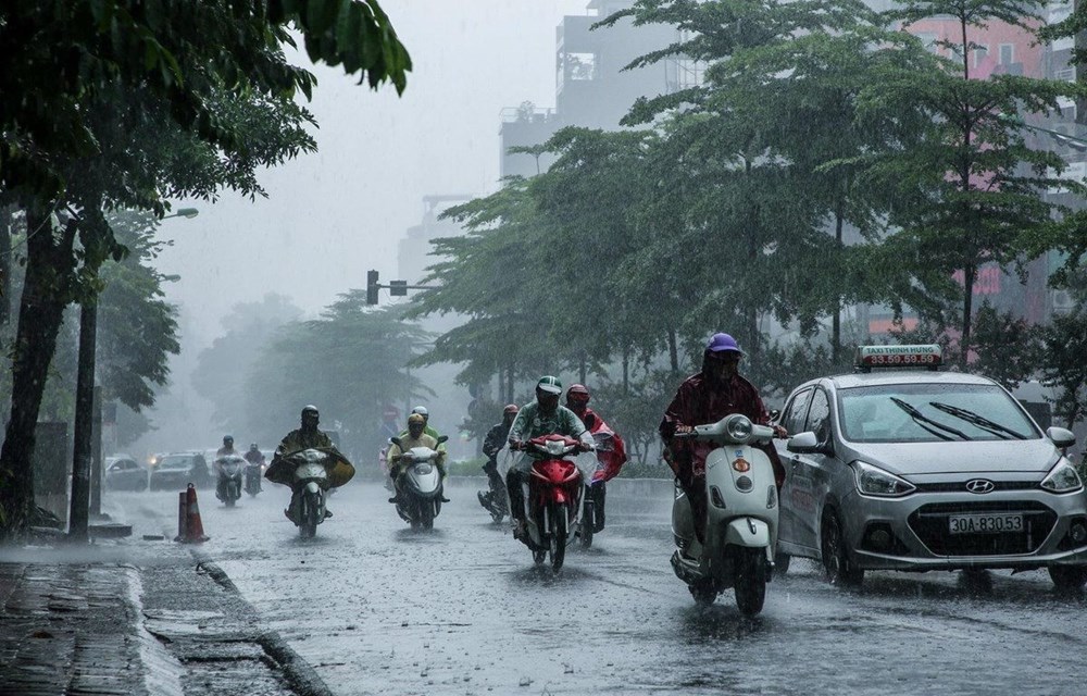 Thời tiết hôm nay 12.7: Hà Nội và TP. Hồ Chí Minh mưa dông cục bộ - ảnh 1