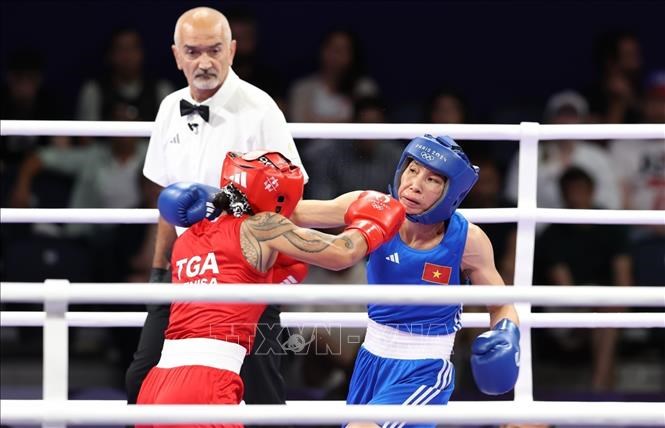 Võ sĩ Hà Thị Linh thắng áp đảo trong trận đầu ra quân Olympic Paris 2024 - ảnh 2