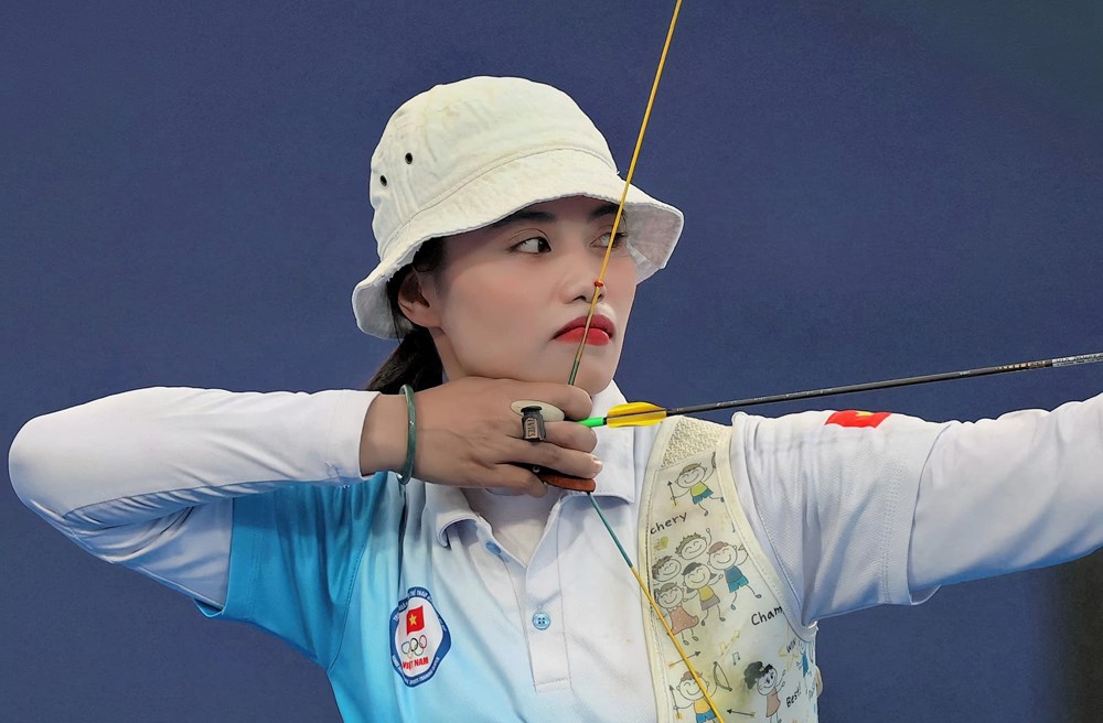 Hot girl làng bắn cung và kỳ tích 2 lần giành vé dự Olympic - ảnh 1