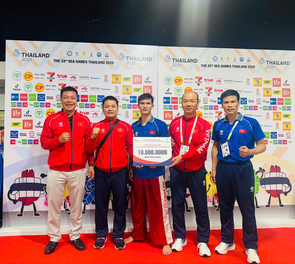 Đánh bại võ sĩ Thái Lan, tay đấm Quang Huy lên ngôi vô địch SEA Games 33 - ảnh 1