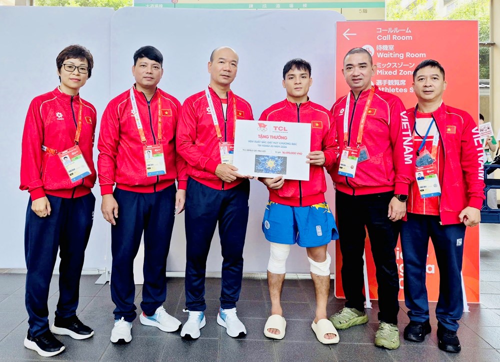 Những người thầm lặng phía sau thành tích của Đoàn Thể thao Việt Nam - ảnh 2