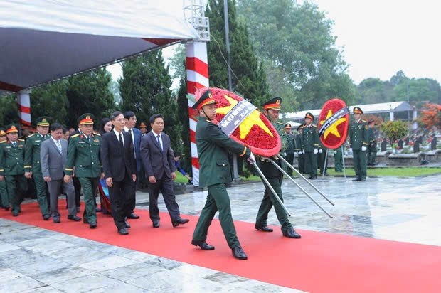 Thanh Hóa tổ chức trọng thể lễ truy điệu, an táng 21 hài cốt liệt sĩ hy sinh tại Lào - ảnh 1