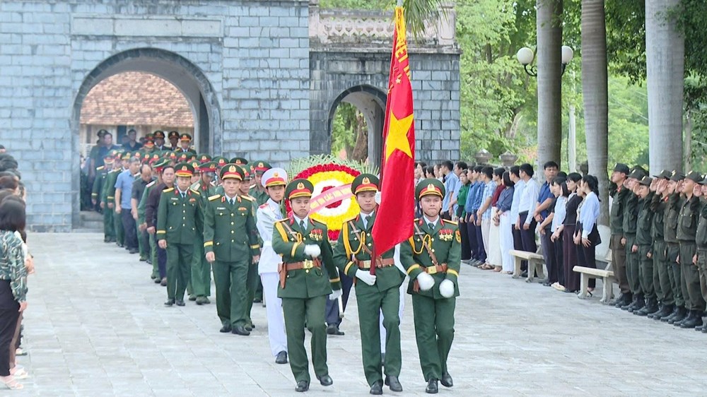 Điện Biên: Truy điệu và an táng hài cốt liệt sĩ quân tình nguyện tại Lào - ảnh 1