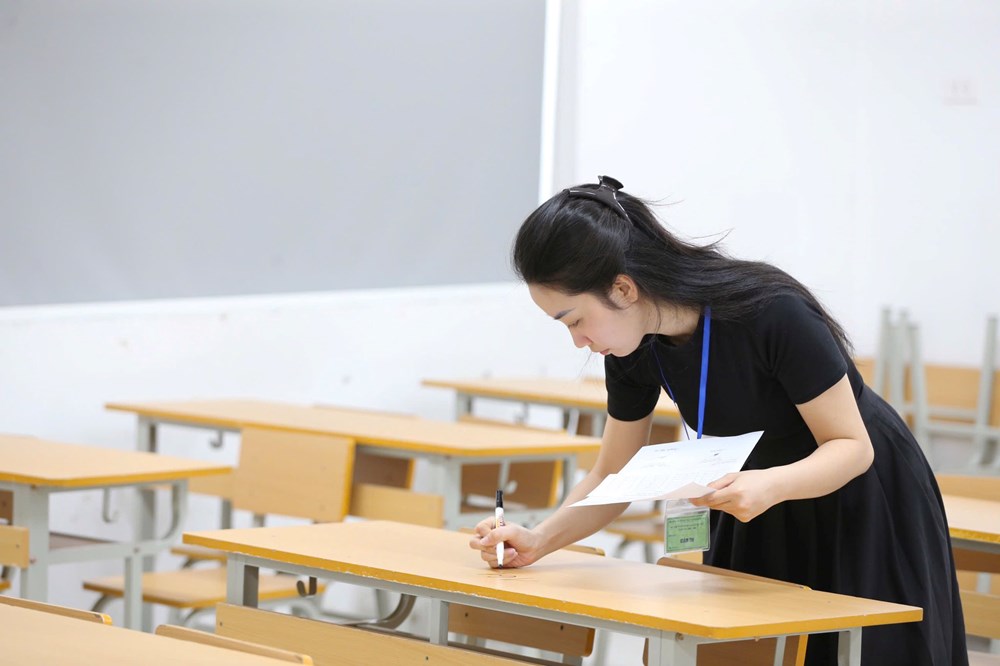 Gần 103.000 thí sinh Hà Nội bước vào môn thi đầu tiên - ảnh 11