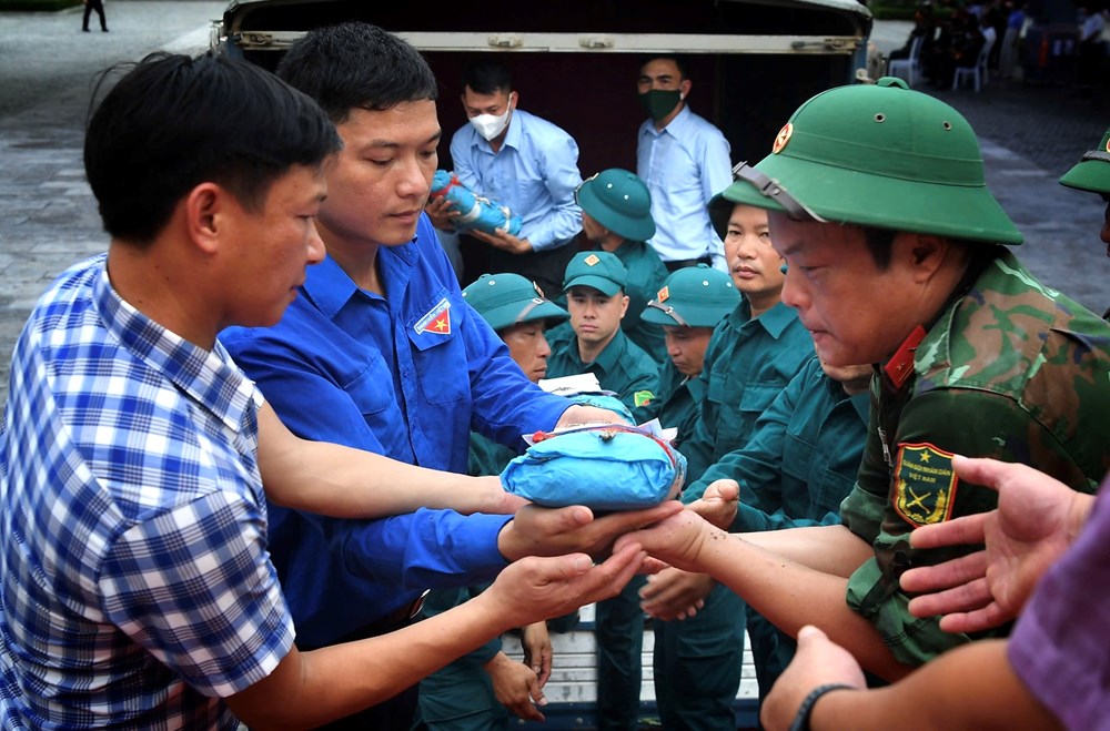 Nghệ An tổ chức lễ truy điệu và an táng hài cốt liệt sĩ hi sinh tại Lào - ảnh 4