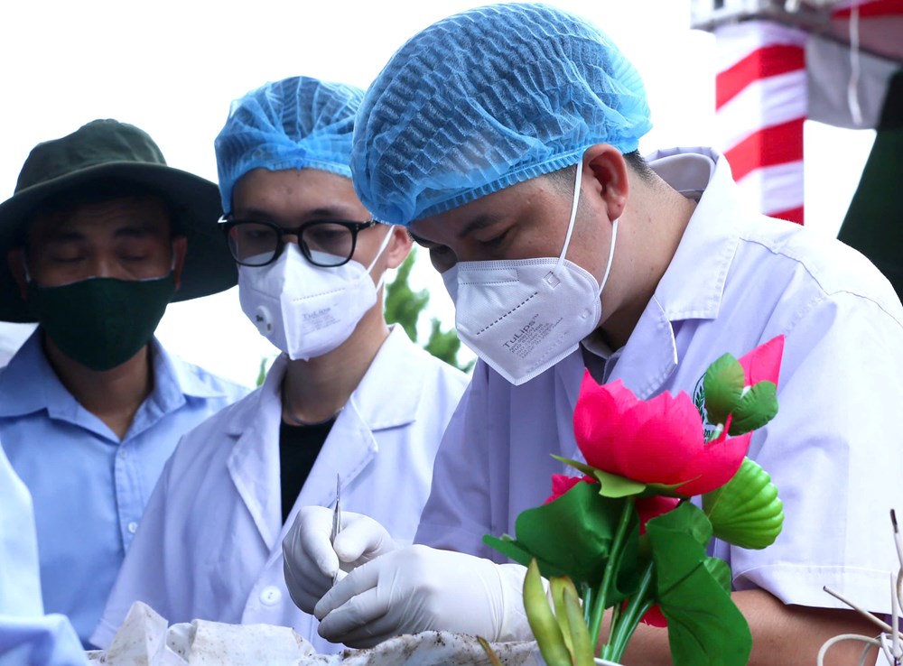 Triển khai lấy mẫu đối với 80 hài cốt liệt sĩ hi sinh trên đất bạn Lào - ảnh 4