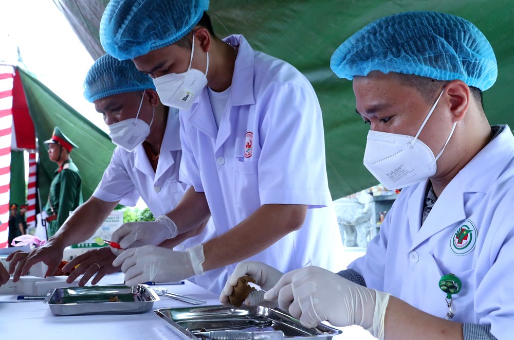 Triển khai lấy mẫu đối với 80 hài cốt liệt sĩ hi sinh trên đất bạn Lào - ảnh 8