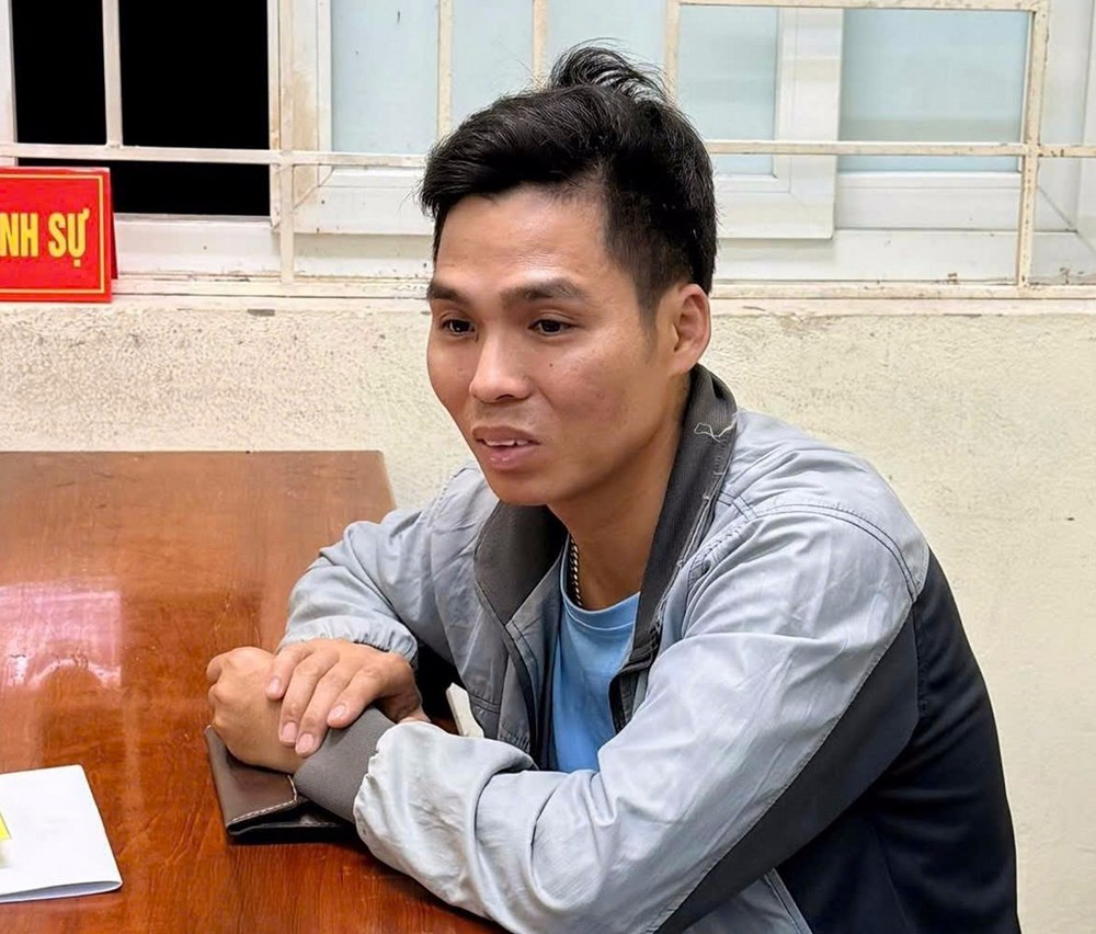 Tạm giữ hình sự tài xế lao xe vào CSGT khi bị kiểm tra - ảnh 1