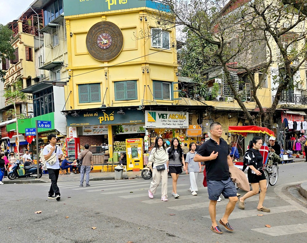  Thảnh thơi dạo phố Hà Nội ngày giáp Tết - ảnh 12