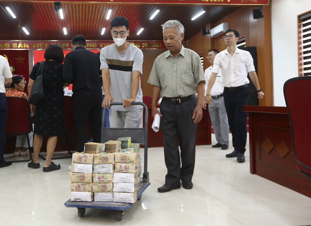 Hà Nội: 19 hộ dân ở Định Công nhận hơn 217 tỉ đồng bồi thường dự án Quốc lộ 1A - ảnh 4