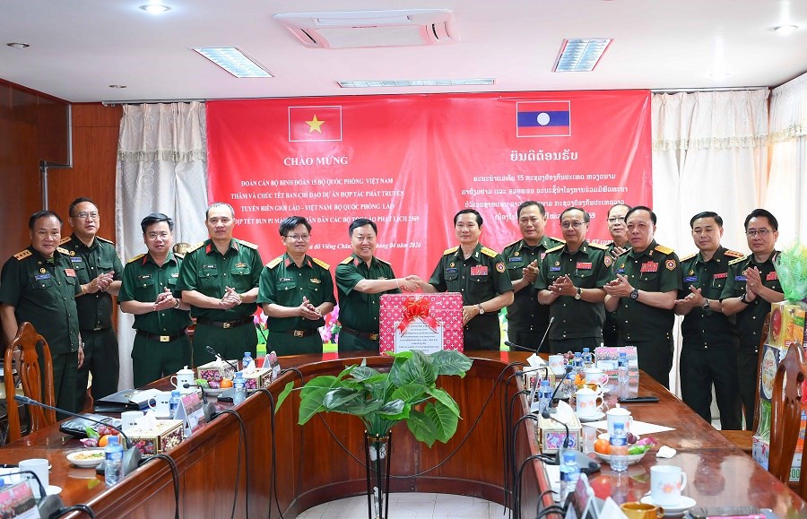 Binh đoàn 15: Thăm, chúc Tết Bunpimay và kiểm tra tiến độ dự án cụm bản Mường Chăm tại Lào - ảnh 1