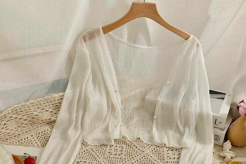 Áo cardigan mỏng trở thành “vũ khí” chống nắng được yêu thích mùa hè - ảnh 1