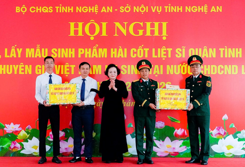 Trang trọng Lễ truy điệu, an táng 80 hài cốt liệt sĩ quân tình nguyện và chuyên gia Việt Nam hy sinh tại Lào - ảnh 14
