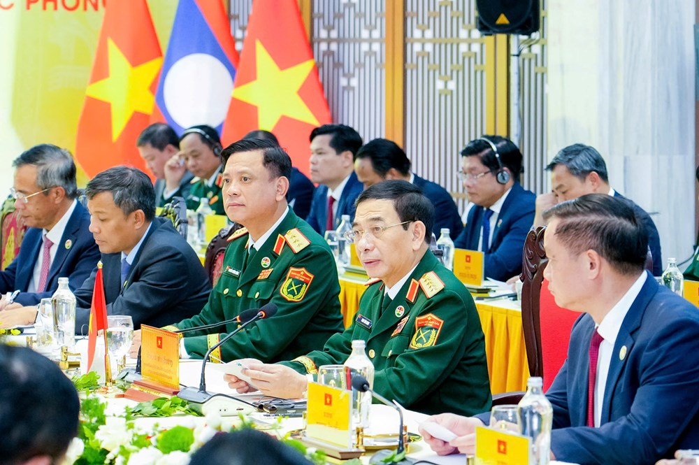 Hội đàm giữa Bộ trưởng Bộ Quốc phòng Việt Nam và Bộ trưởng Bộ Quốc phòng Lào - ảnh 5