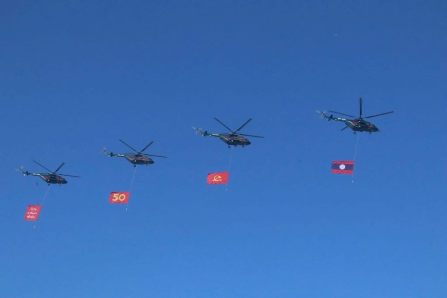 Tổng Bí thư Tô Lâm và phu nhân dự Lễ kỷ niệm 50 năm Quốc khánh Lào - ảnh 6