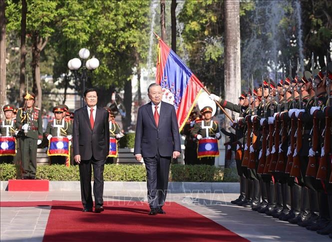 Lễ đón trọng thể Tổng Bí thư Tô Lâm tại thủ đô Viêng Chăn (Lào) - ảnh 3