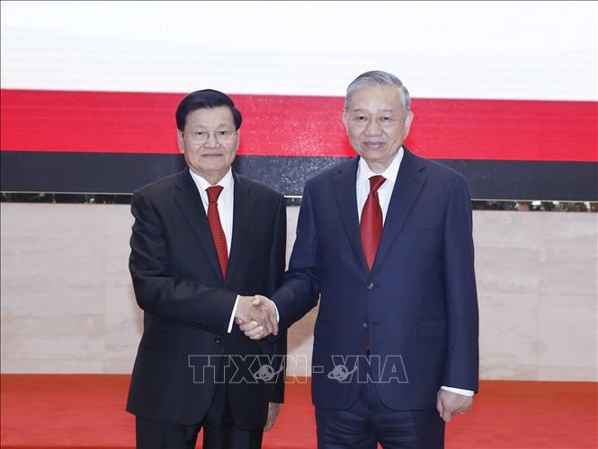 Tổng Bí thư Tô Lâm thông báo kết quả Đại hội đại biểu toàn quốc lần thứ XIV của Đảng Cộng sản Việt Nam tại Lào - ảnh 1