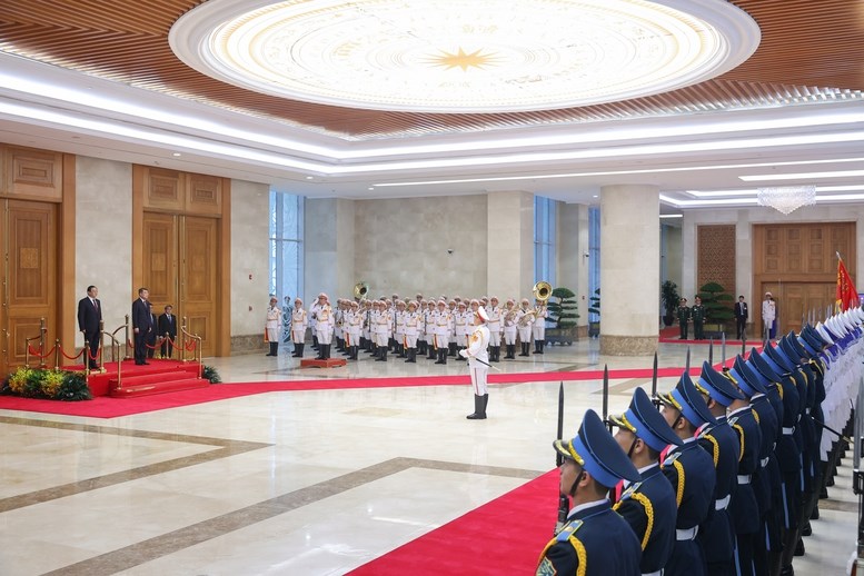 Thủ tướng Lê Minh Hưng chủ trì lễ đón chính thức Thủ tướng CHDCND Lào - ảnh 2