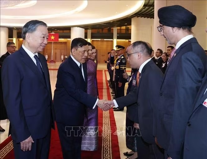 Tổng Bí thư, Chủ tịch nước Tô Lâm chủ trì Lễ đón chính thức Nhà vua Vương quốc Thái Lan và Hoàng hậu - ảnh 2
