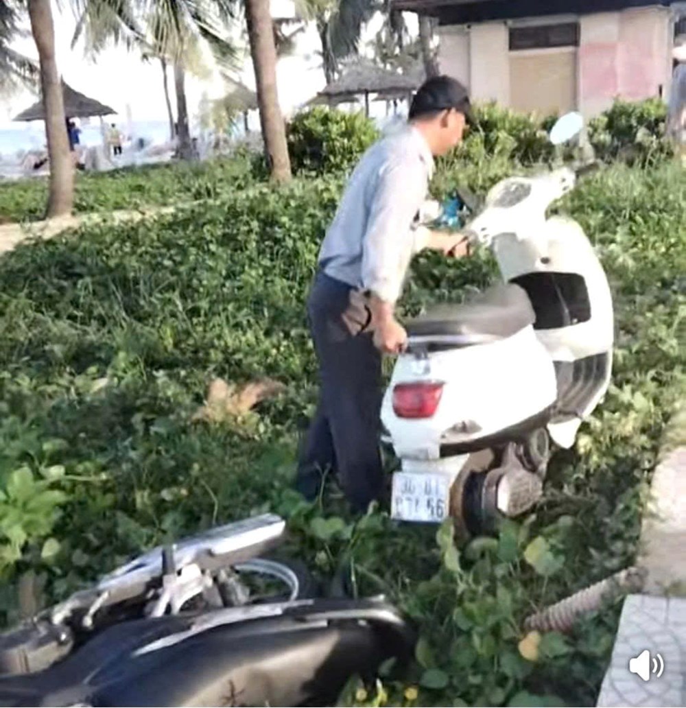 Thực hư clip nhân viên xử lý xe máy ở vỉa hè ven biển - ảnh 1