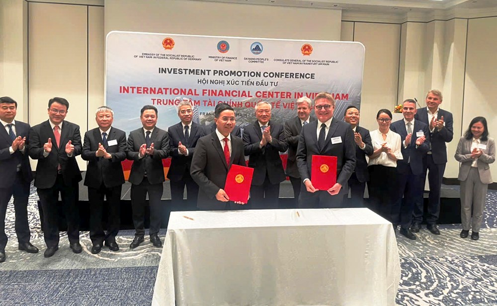 Đà Nẵng ký kết hợp tác về Trung tâm tài chính với Công ty Frankfurt Main Finance (Đức) - ảnh 1