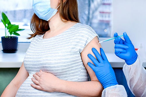WHO khuyến cáo việc phòng chống cúm mùa cho phụ nữ mang thai - ảnh 1