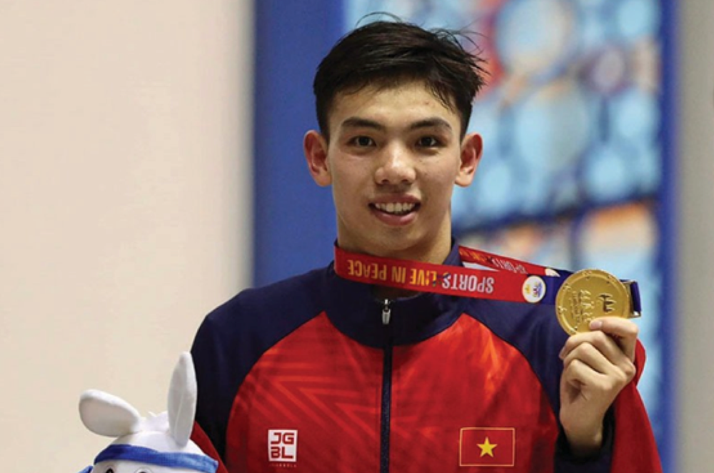 “Rái cá sông Gianh” - Chàng trai vàng của Thể thao Việt Nam - ảnh 1