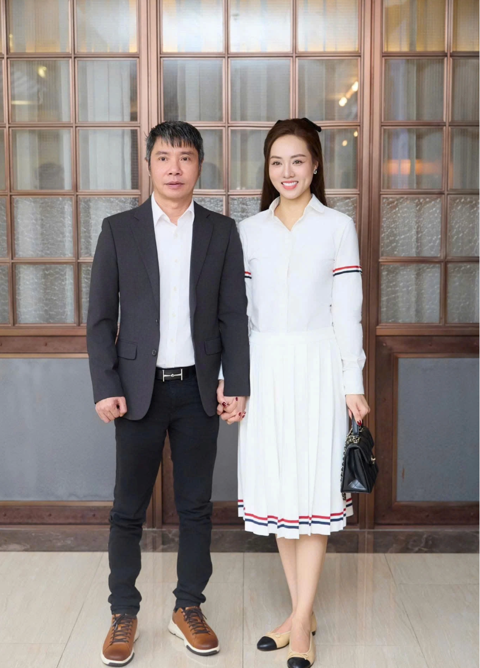 Vợ chồng Công Lý - Ngọc Hà lạc quan đối diện với những tin đồn đời tư. Ảnh: FBNV