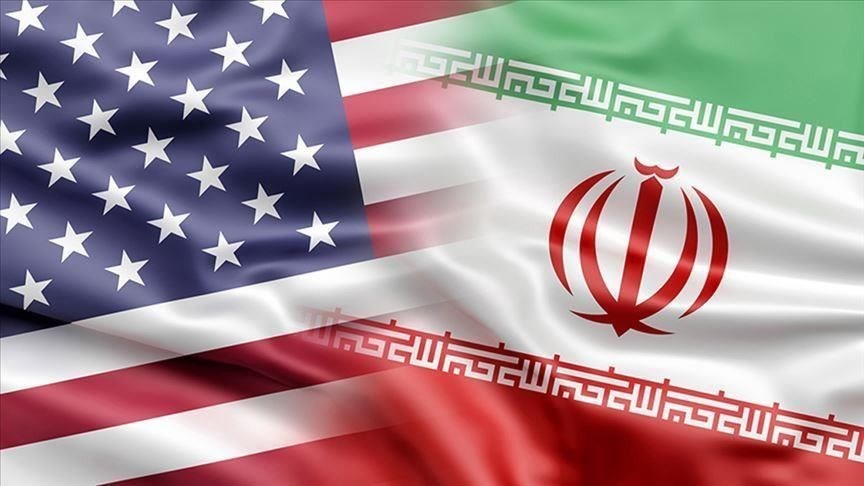 Quốc kỳ Mỹ và quốc kỳ Iran. Ảnh minh họa: Anadolu Agency