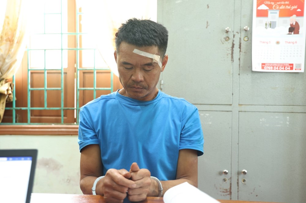 Bắt giữ đối tượng dùng rựa chém hai cán bộ Công an - ảnh 1