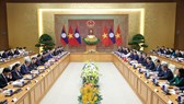 Việt Nam và Lào thống nhất đẩy mạnh giao lưu văn hóa, thể thao, du lịch