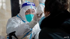 Thành phố của Trung Quốc siết chặt hoạt động do ca mắc Covid-19