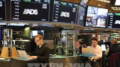 Phố Wall tăng điểm sau quyết định hạ lãi suất của Fed